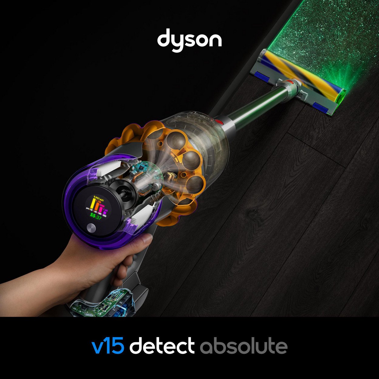 Ein Dyson V15 Staubsauger mit leuchtendem Bodenteil auf dunklem Holzboden.